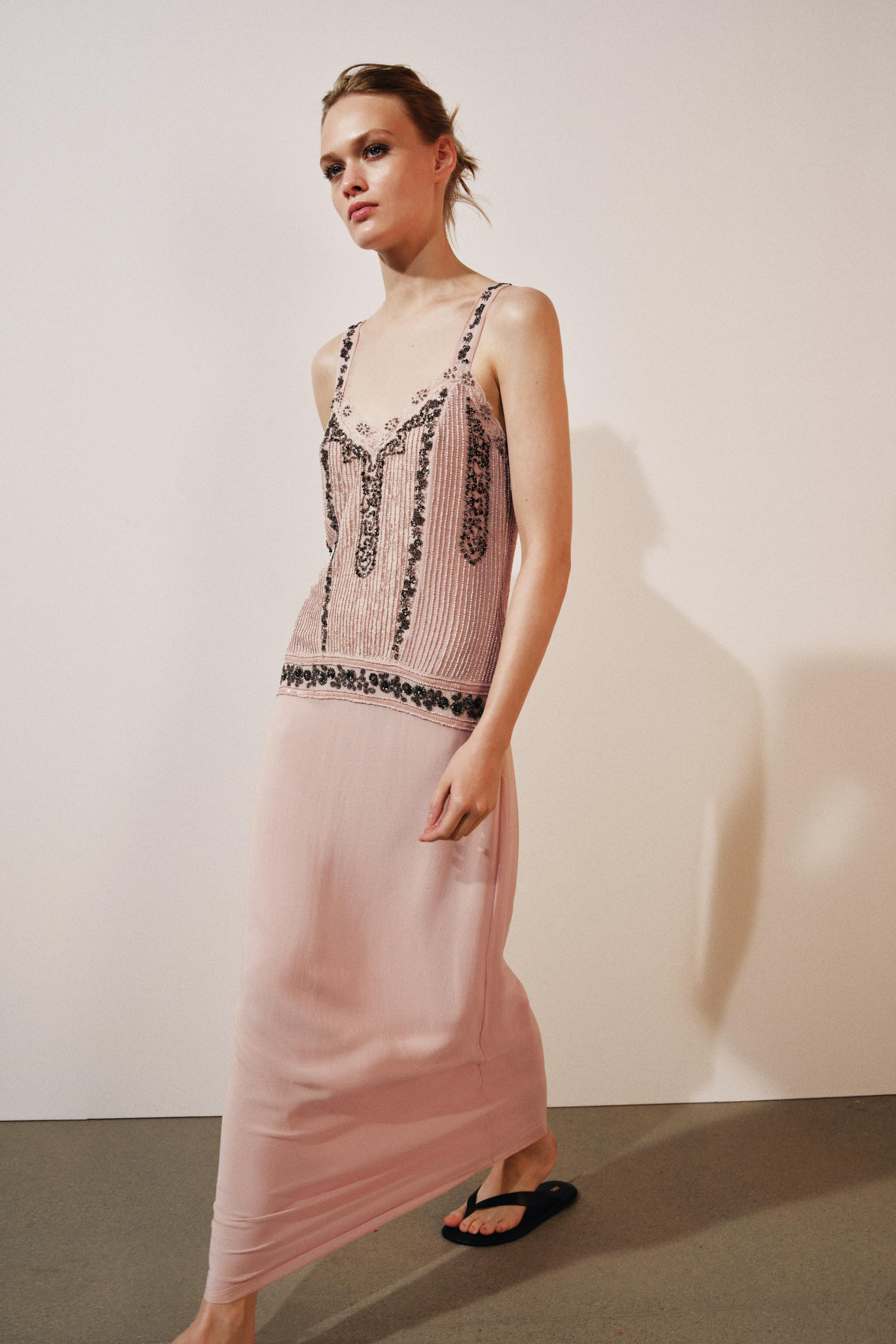 ZARA WOMAN COLLECTIONDress made of viscose yarn. V-neck with wide straps. Featuring contrasting b... | Zara US