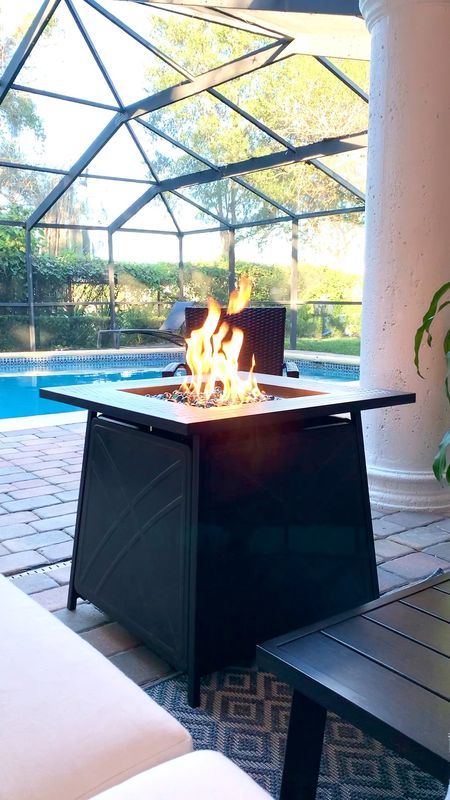 Such a great little fireplace table for those cool evenings. Comes with beautiful blue stones and can be used as a table as well.

#LTKhome #LTKfamily #LTKVideo