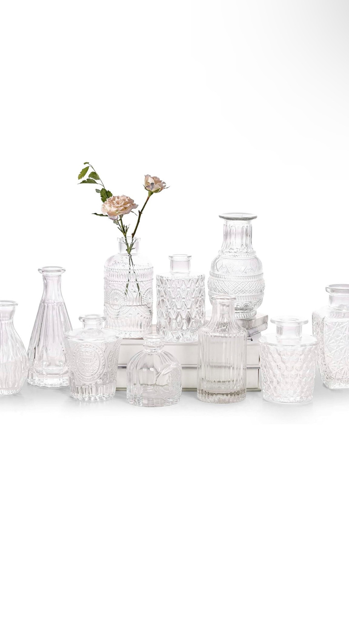 Mini glass vase collection for a dinner party setup. #LTKEntertainment