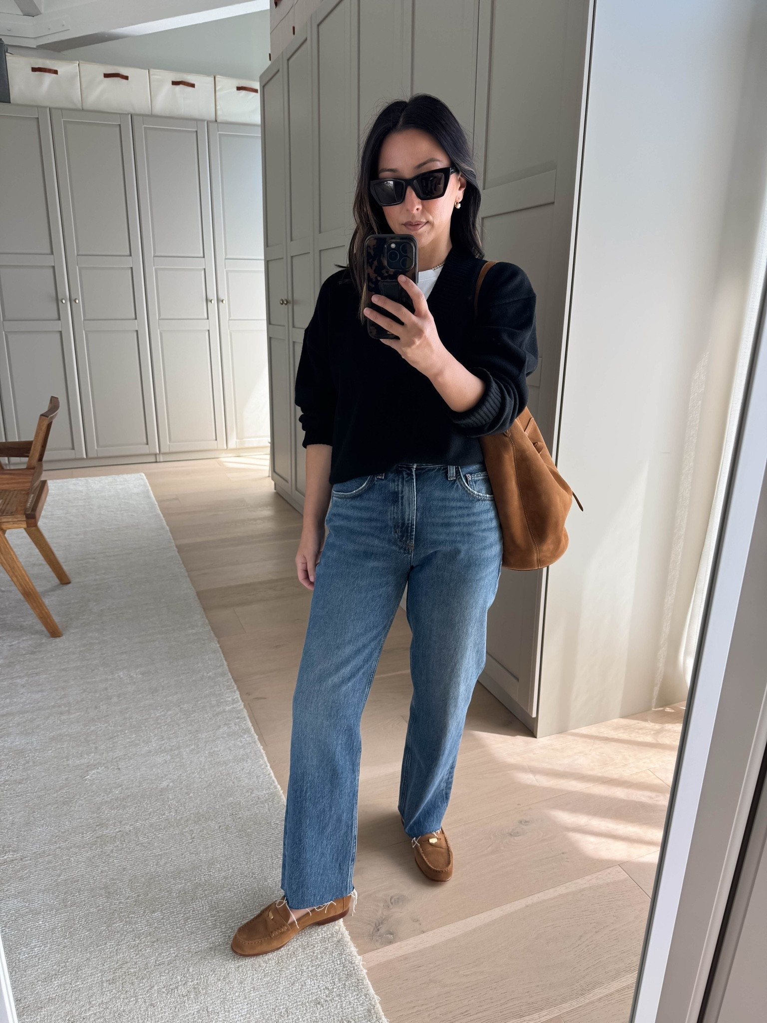 This black v neck with white tee under a perfection! Picky with my v-necks, but this combo is great! Sweater runs roomy. You can size down for a more fitted look. 

Quince cashmere sweater xs
Everlane tee medium
Agolde Valen jeans 25 - cut hems
Veronica Beard loafers 5.5
Liffner bucket bag
YSL sunglasses 
Dorsey Cecilia earrings 3.4
Dorsey James necklace 15”

#LTKmomlife #LTKPetite #LTKOver40