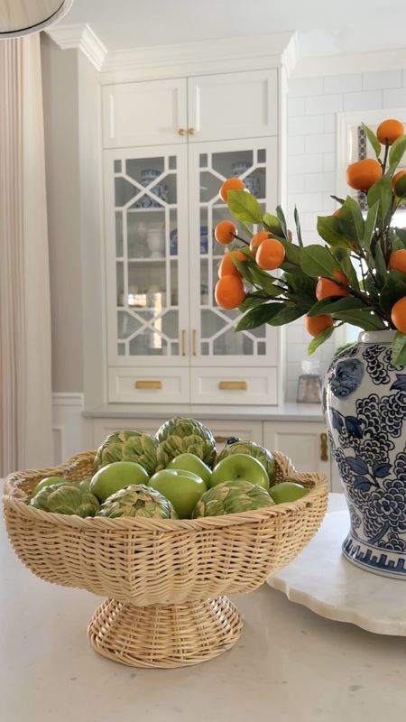 The prettiest spring home decor in our kitchen! Gorgeous tangerine branches, faux fruit and a gorgeous woven pedestal bowl💙Chic and colorful perfect for spring!

#LTKhome #LTKSeasonal #LTKstyletip