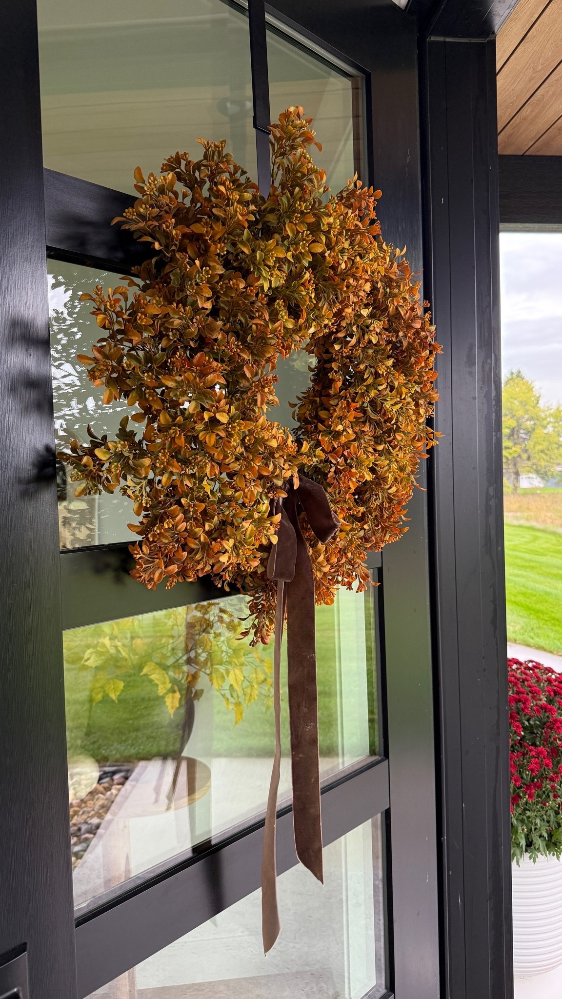 My oversize front door wreath from Amazon and the brown velvet ribbon I added to it!