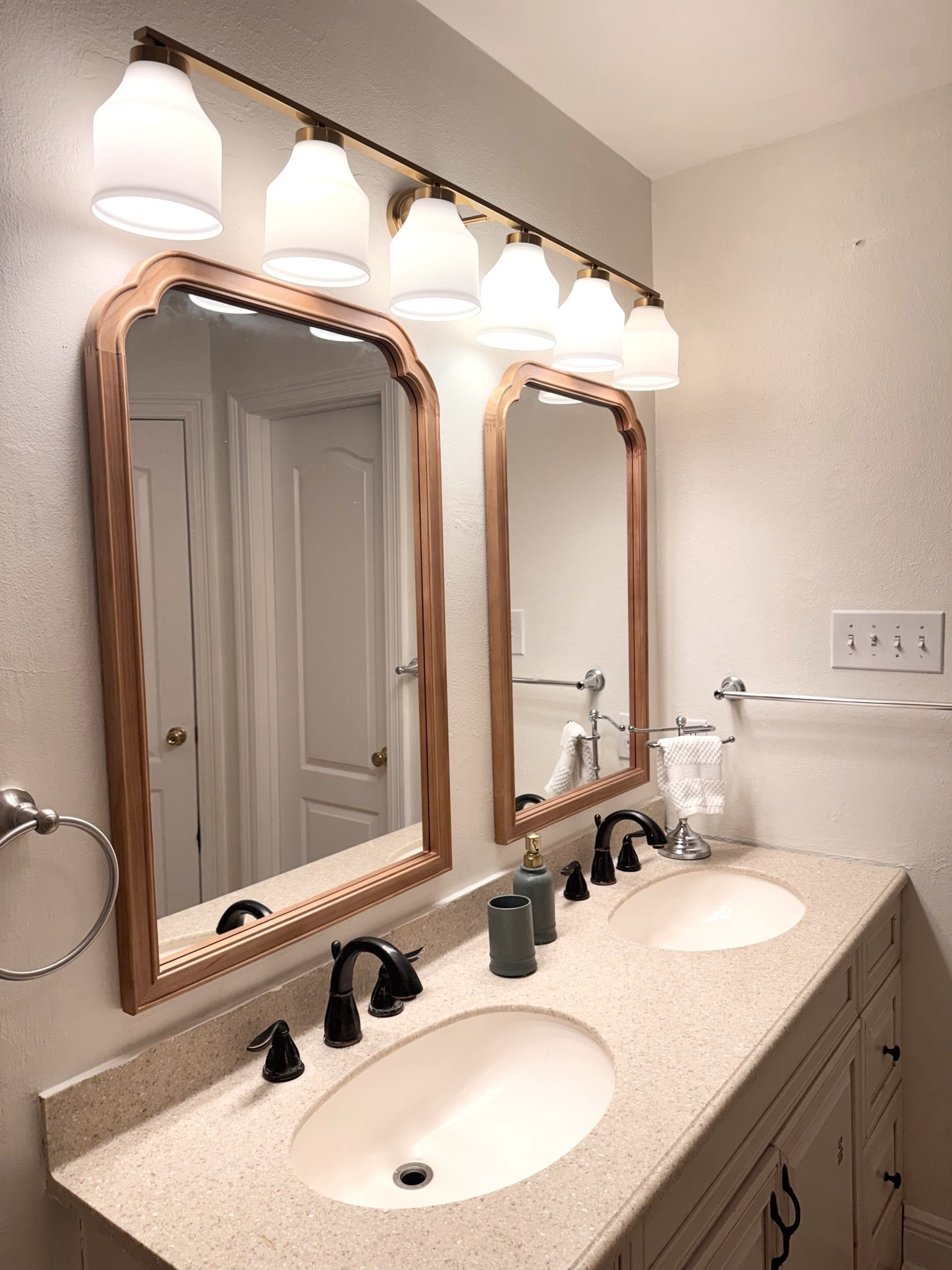 Quick and easy bathroom update. Changed out the lighting and mirrors for a whole new look. @Wayfair has awesome choices for vanity lighting and over the sink mirrors. #vanitylight

#LTKHome #LTKmomlife