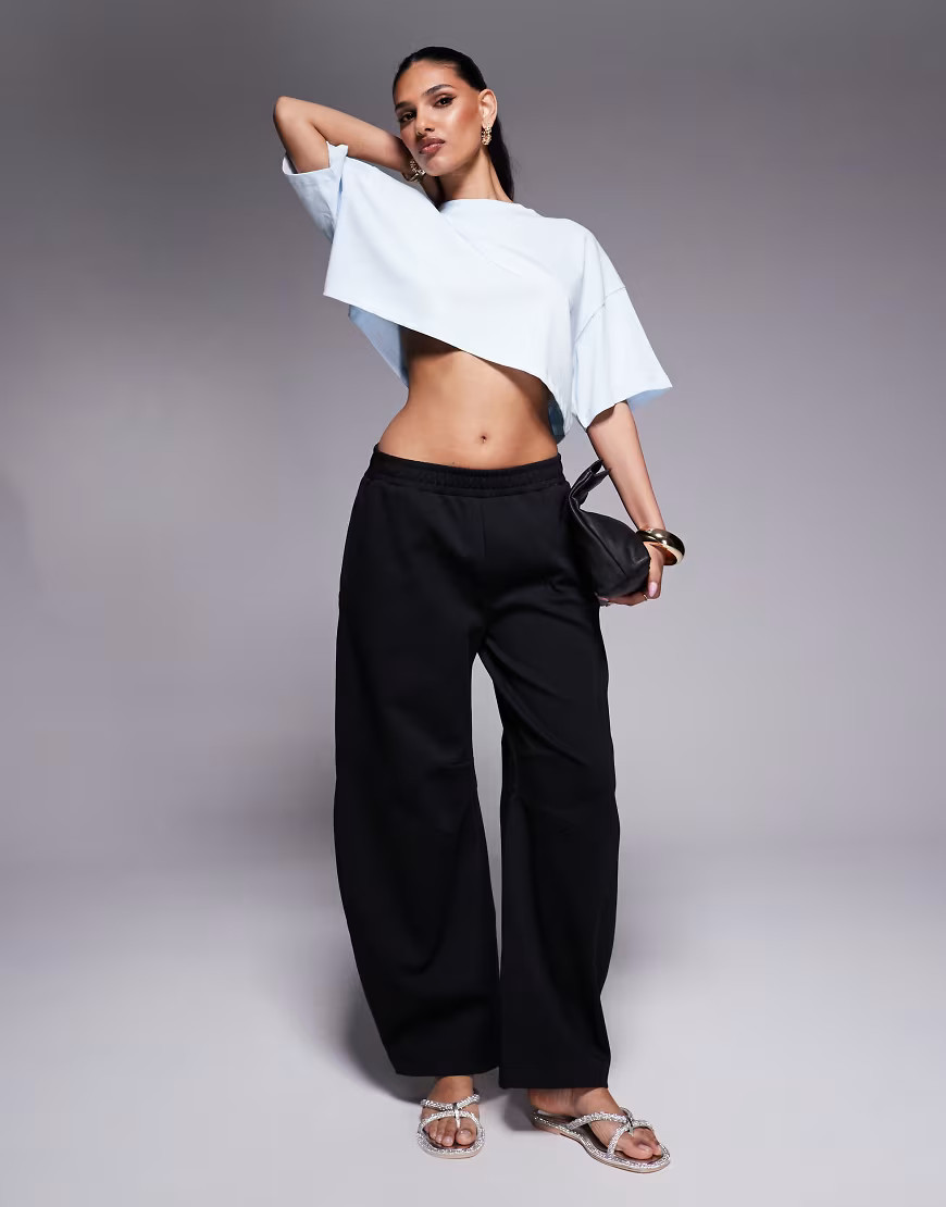 ASOS DESIGN interlock barrel leg sweatpants in black | ASOS (Global)