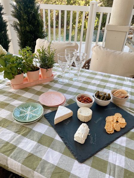 ((Paid partnership @wayfair)) Spring is finally here! I'm excited for warmer weather, more daylight, and eating meals outside. I put together a simple cheese and wine spread using a pretty gingham tablecloth, serving board (with chalk for labeling) and vintage-inspired cabbage plates. I hope this inspires you to enjoy a meal outside soon! #wayfair