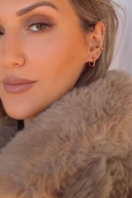 Gold earrings 
Gold ear cuff 
Jewelry 
Holiday outfit 
Holiday party 
Gift guide 
faux fur coat 
Jackets 
Gifts for her 



Wearing the Alta Ear Huggies and Deia Cuff here - all tarnish free and on MAJOR sale 30-50% off 



#LTKHoliday #LTKGiftGuide #LTKCyberweek