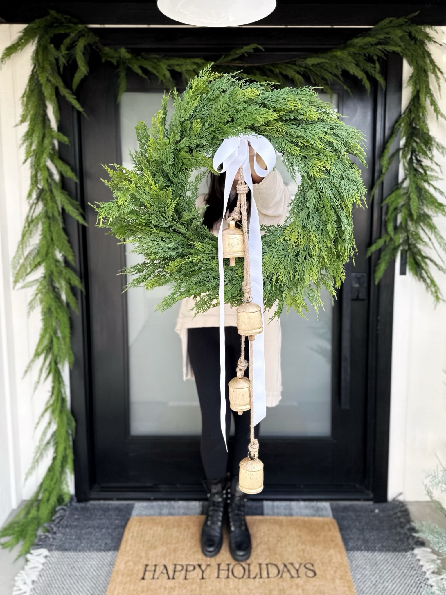 Seasonal front porch decor. 

Christmas front porch, holiday, holiday front porch, wreath, garland, ribbon, bells, outdoor mat, Christmas mat, holiday front door, seasonal front door, home decor Christmas, double layered rug, porch decor, front door decor, pre-lit trees. 

#LTKHoliday #LTKSeasonal #LTKfindsunder100