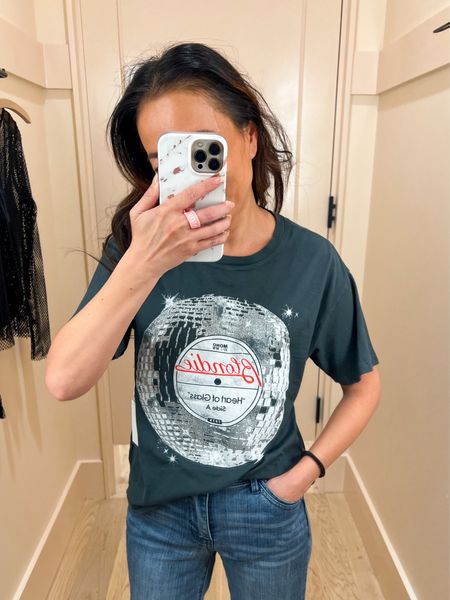 Loving the silver glitter in this graphic tee! Great for a casual New Year’s Eve. TTS XS. Relaxed fit, unique gray-navy color!

#LTKstyletip #LTKfindsunder100 #LTKover40