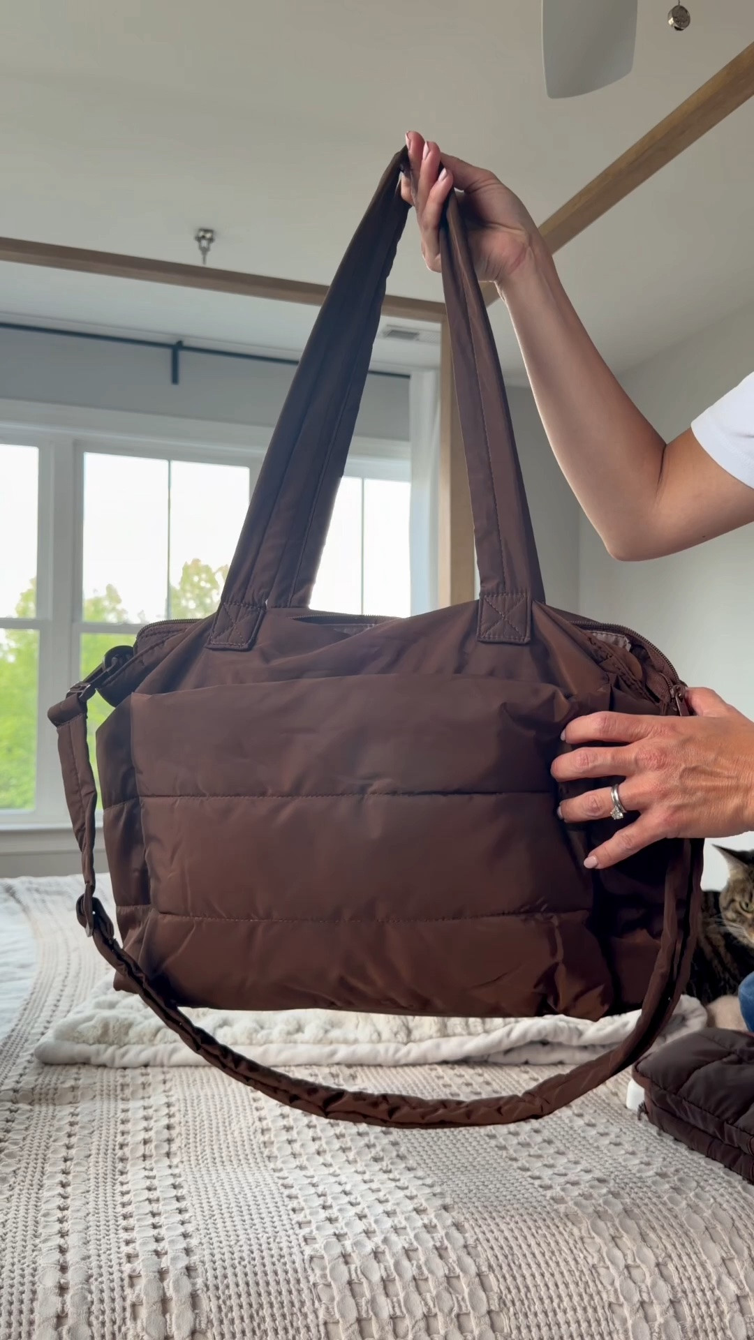 I bought this bag before a recent trip to replace the backpack I usually take and loved it! I wanted a bag that would be easy to take my laptop in and out for security but still keep it protected. This bag did the trick with room to spare for a cashmere wrap to stay warm, snacks for the plane and a couple of water bottles! Laptop sleeve plus multiple interior pockets to stay organized. Also added a cord and device organizer which was nice for keeping everyone’s charger, AirPods and devices in order for the flight. Plus this color is a perfect match to my Beis luggage.

#LTKTravel