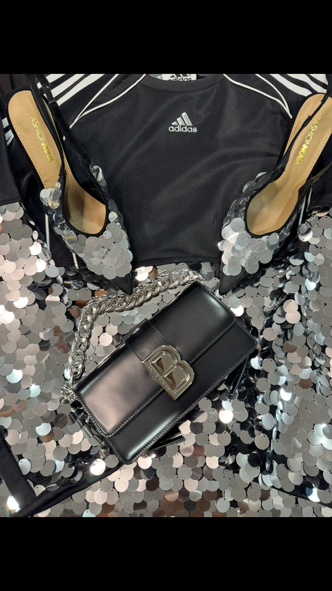 What I wore for date night with my husband 🖤 #adidas #sequin #fashionova #shopakira #brandonblackwood

#LTKgrwm #LTKootd #LTKBeauty