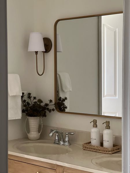 Bathroom design. I love using these plastic soap dispensers to dress up a bathroom and with them being dispensers being customizable, I don’t have to worry kids knocking them over.

Customizable soap dispensers. Rounded corner mirror. Bathroom sconces. Small vase. White towels. Target. Afloral.


#LTKFind #LTKstyletip #LTKhome