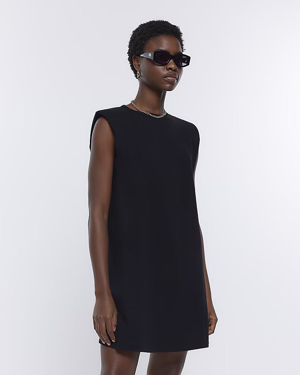 Black shoulder pad t-shirt mini dress | River Island (UK & IE)