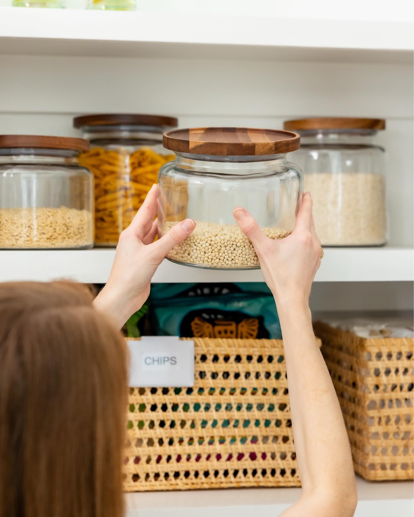 Recently I explained to someone what “decanting” means in the world of organizing, and it got me thinking about all its benefits. 

For those who may not know, decanting is the act of removing items from their original packaging and storing them in some other container, often a clear plastic canister or glass jar of some sort.

Of course, it makes things look so much tidier, but there’s more to it. Decanting items in your pantry allows you to see exactly what you have and know when something is running low. It keeps things fresh and prevents pests from being attracted to your food. And it eliminates the need to throw out expired food that got lost in the back and allows you to buy in bulk and refill as needed, both saving you money! 

You may say: “that’s expensive” or “I don’t have time to keep that up”. Yes, it can be an investment, but you don’t have to do it all at once. You can do it little by little, and you can choose containers as expensive or inexpensive as you wish. Then all it takes is getting in the habit of spending a couple extra minutes after each grocery trip to put things away and refill any canisters. ✨
.
.
.
#decanting #pantryorganization #foodstorage #organizedpantry #organizedhome #homeorganization #pantrygoals #pantrymakeover

#LTKHome #LTKFamily