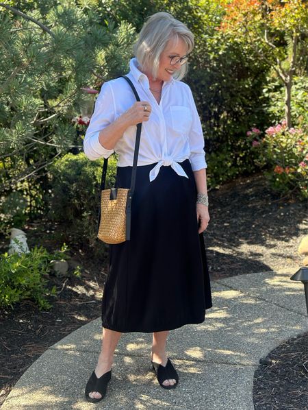 Favorite Athleta travel shirt is on sale today! Currently wearing with a washable crepe skirt that’s also travel friendly. 
Wearing top in S
Skirt in S


#LTKstyletip #LTKtravel #LTKsalealert