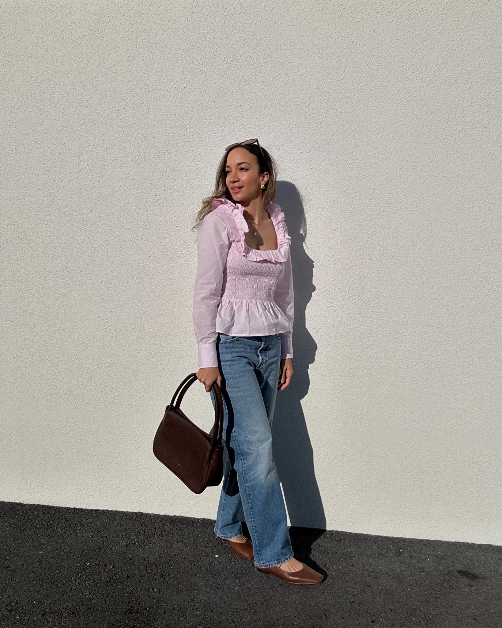 Spring styling, status anxiety, brown bag, brown accessories, Ganni Blouse, Levi’s, ballet flats, ruffles, style inspo, elevated basics, everyday dressing 

#LTKstyletip #LTKshoecrush #LTKeurope