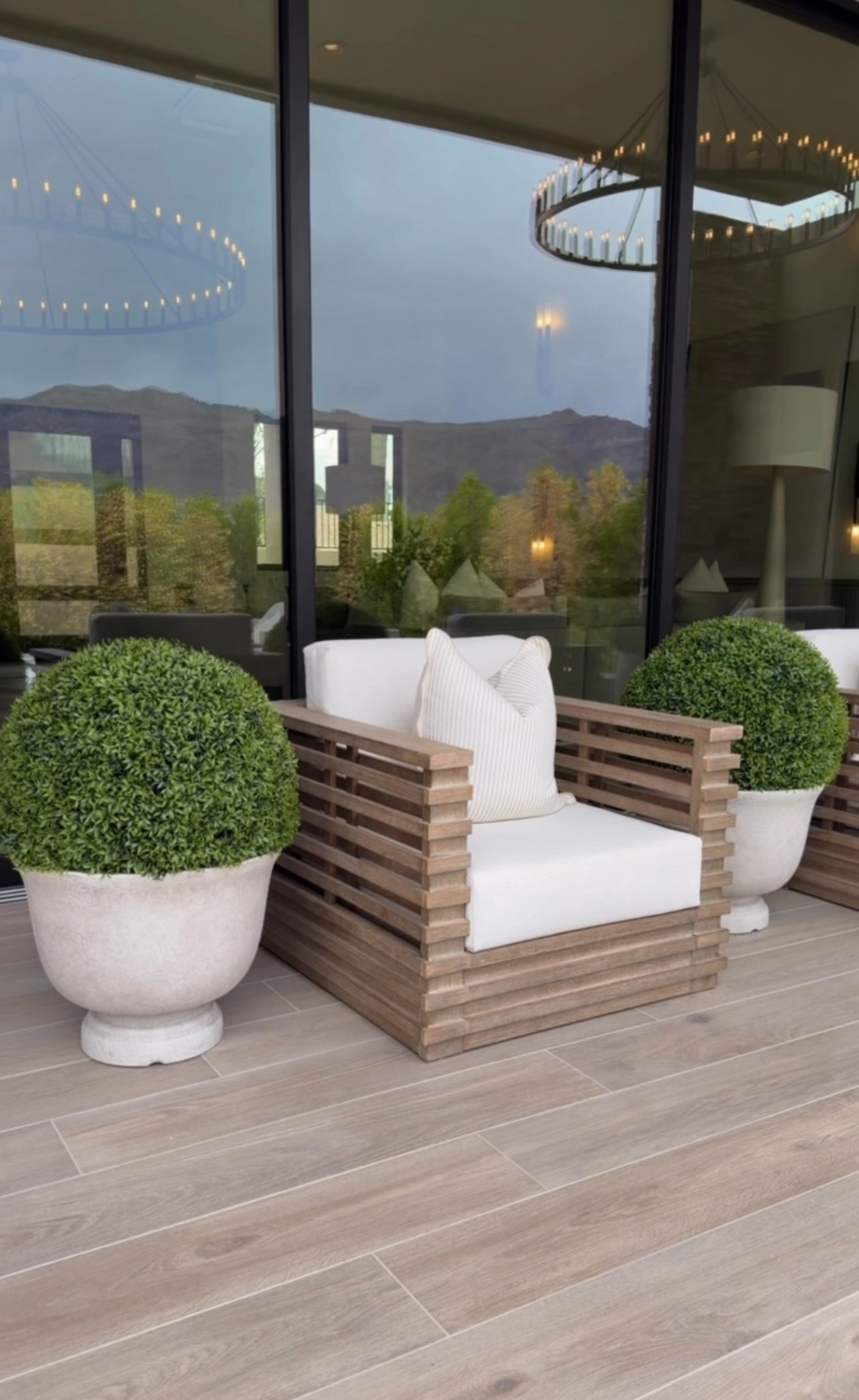 Nothing speaks elegance more than topiary. 🌱✨ Amazon has these beautiful topiary balls that perfectly complimented my outdoor accent chairs! I love you so much and they are perfect for summer!

Modern outdoor home decor
Outdoor decor Inspo
Modern neutral home decor
Faux topiary 
￼
Summerthompsonstyles 

#LTKHome #LTKU #LTKSaleAlert