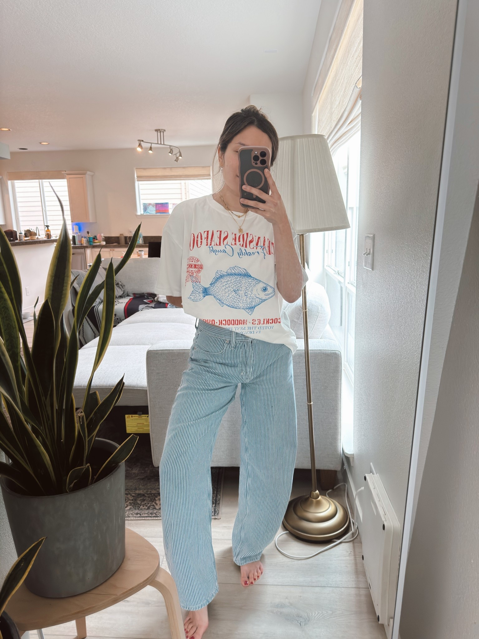 My favorite pair of barely barrel pinstripe railroad pants. They’re so soft and relaxed! Definitely got it in both yellow and blue. 5’3” 117lb for reference. Size 26/2 regular. The top is perfectly oversized. I did decide to size up to M just for a more boxy look. 

#LTKootd #LTKPetite #LTKmomlife