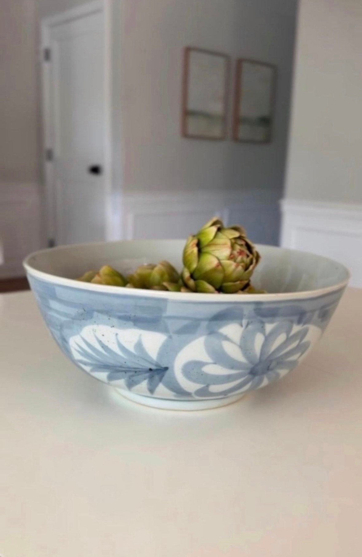 This large decorative bowl is perfect for a centerpiece, console table, or shelf decor! I have it on my dining table and love it!

#LTKHome
