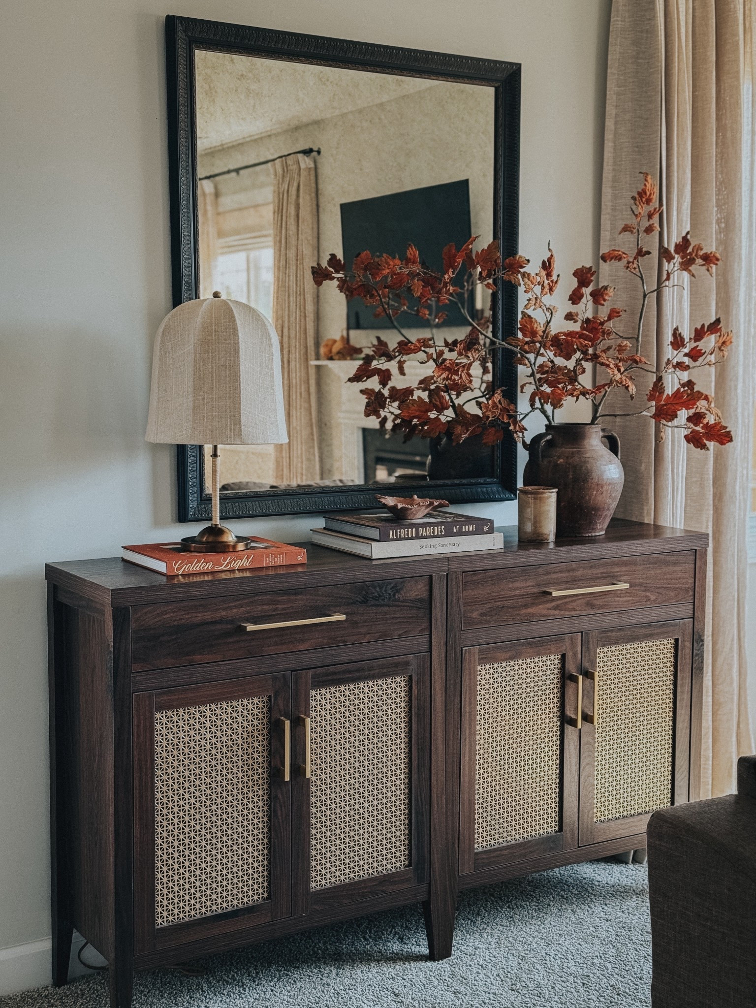 Console table styling. Autumn console. Pal leaf stems. Brown cabinet. Sideboard. Earth tone. Earthy interiors  

#LTKFindsUnder100 #LTKStyleTip #LTKHome