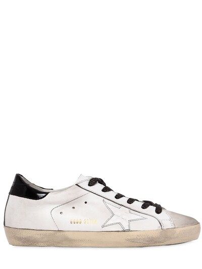 GOLDEN GOOSE DELUXE BRAND - 20MM SUPER STAR LEATHER SNEAKERS - SNEAKERS - WHITE/BLACK - LVR.COM | Luisaviaroma