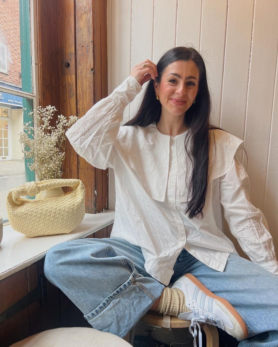 Damson madder, Albaray, Monki, Anthropologie, Adidas, & Other stories, Asos, transitional outfit, transitional style, spring outfit, spring fashion, white shirt, peter pan collar top, ruffle top, blue knit jumper, knit cardigan, wide leg jeans, turn up jeans, Adidas sambas, woven bag, tote bag, spring outfit ideas, style inspiration 

#LTKSeasonal #LTKeurope #LTKstyletip