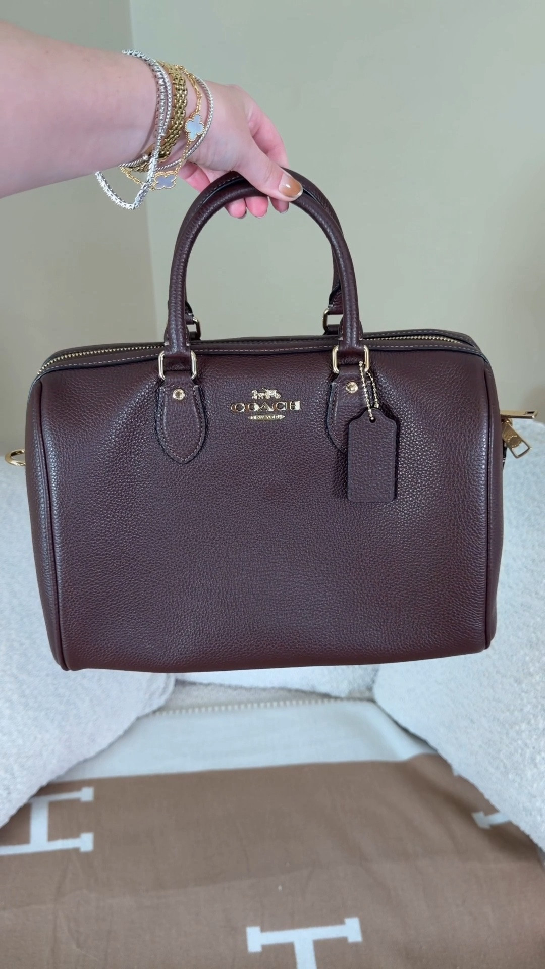 The Coach Outlet large maple Rowan is finally back in stock, just in time for fall 🍂 Comment SHOP & I’ll dm you the link! 🍂

Maple is my favorite Coach color and the large Rowan in maple has been sold out! It is one of the Coach outlets bestsellers and it sells out fast so I was fortunate enough to be able to grab one (they are still currently available online)!

I love that this large Rowan is slouchy and soft like the large suede Rowan so it doesn’t feel bulky like the stiff medium Rowan.

This is the perfect everyday bag for fall!