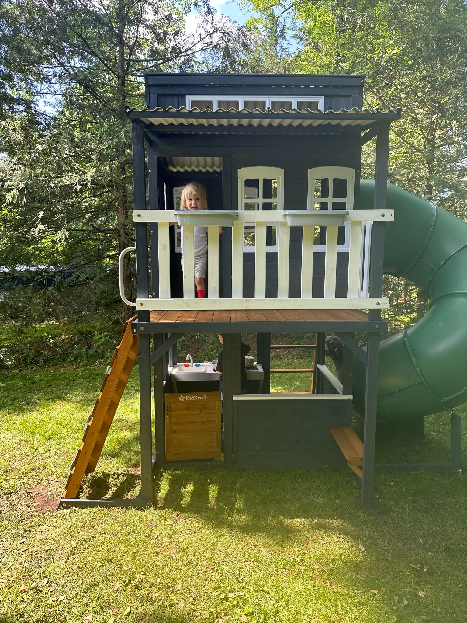 The CUTEST ever backyard kids playhouse! We got one to match our house but they have so many cute options. My kids are obsessed! 

#LTKkids #LTKhome #LTKfamily