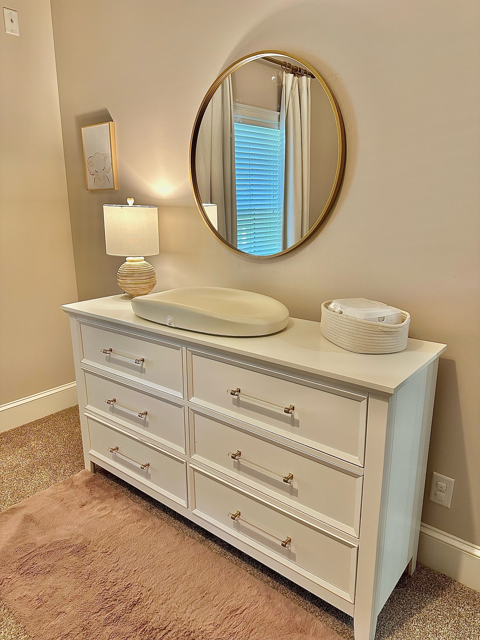 Nursery details! 

#nursery #nurseryfavorites #dresser #whitedresser #nurserydresser #livingspaces #livingspacesdresser #goldmirror #goldcirclemirror #goldmirrordupe #anthropologiedupe #babynursery #lampnursery #walldecornursery #girlnursery #changingpad #changingtable 

#LTKBaby #LTKKids #LTKFindsUnder100