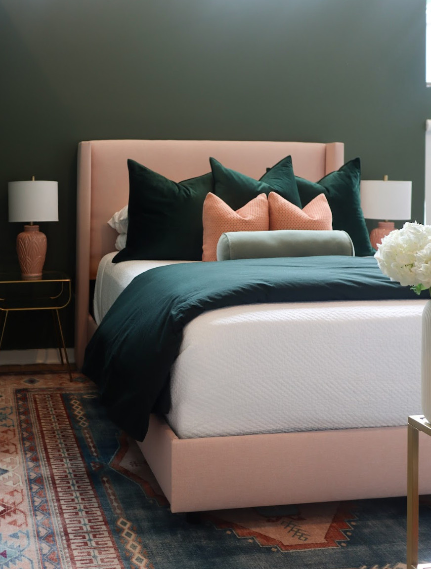 This modern bohemian retreat is proof that bold color and layered texture can completely transform a space.✨ We reimagined the room with rich emerald green, soft pink accents, and warm, earthy details to create a cozy, eclectic oasis full of personality. Every choice — from the updated palette to the thoughtfully curated decor — was made to reflect the homeowner’s unique style. The result is a space that feels modern, relaxed, and deeply personal, turning something simple into something truly special.🌿💗 

 #bohochic #modernbohemian #eclecticstyle #LTKHome #LTKFamily