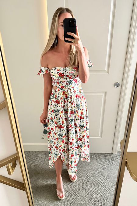 This dress is so great for summer because it’s light and flowy with fluttery straps. The skirt part has 2 overlapping side slits, and the top part has 2 side cutouts with a smocked back. I love it paired with a clear wedge! Size: xs

#LTKstyletip #LTKSeasonal #LTKunder100