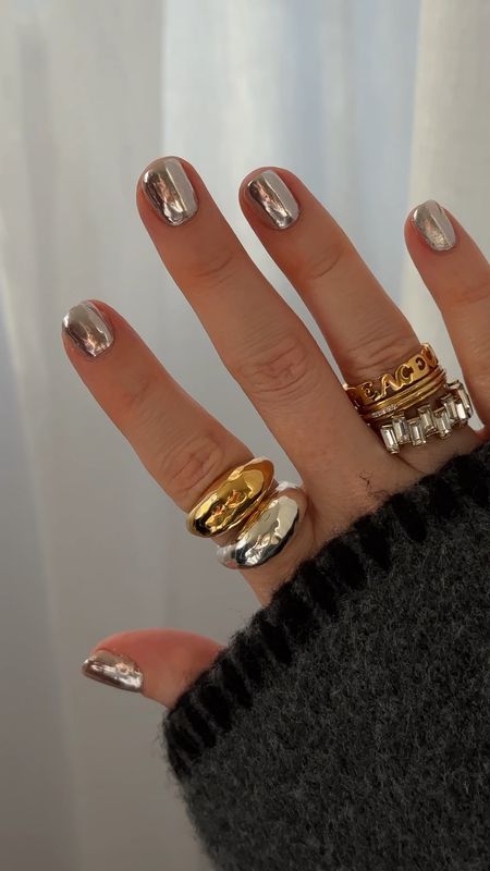 LOVING my silver chrome nails  🪩🪩👽👽
Chrome powder | UV nails | Gel nails at home | Mani ideas | Manicure | Mirror nails | Gold ring | Silver stacking rings | Blanket stitch jumpers 

#LTKfindsunder50 #LTKbeauty #LTKparties