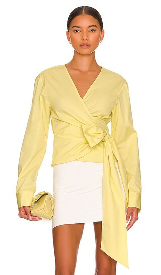 Ester Wrap Top in Cornsilk | Revolve Clothing (Global)