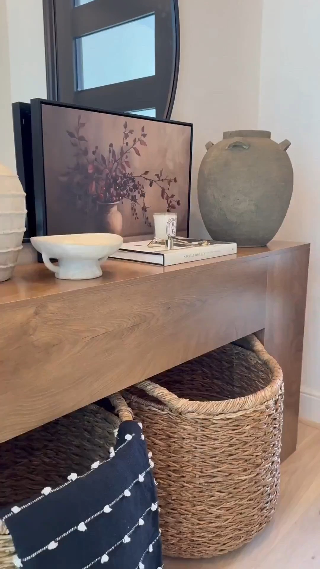My bathroom vanity feels so warm and inviting with a few seasonal accents like these cimicifuga stems 🌿 The brown accent chair adds the perfect cozy tone 🪑 and I love how the backsplash and vanity combo keep everything neutral while still adding warmth 🤍

My artwork has been such a favorite 🎨 available in so many sizes and styles, it’s perfect 🤩 I’m also obsessed with my white oak console and dining tables that carry that same warmth throughout my home. And this vintage-inspired vase is so versatile, it works beautifully as a planter and adds that timeless look.🏺✨