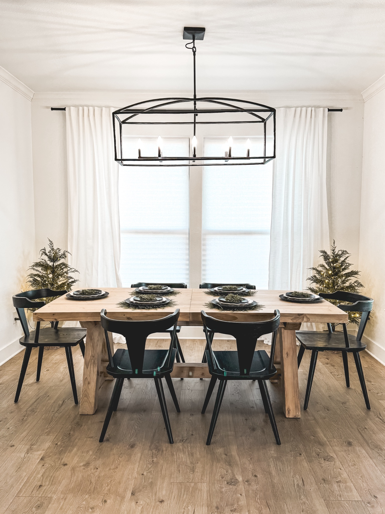Shop my house - Christmas Dining Room 

This year I’m going for simple and understated.  

Neutrals with a pop of green and black. Table chargers are from Hobby Lobby in black. 

Mini twinkle trees are sold out.  Linking similar trees 🌲. 

#christmasdecor #diningroom #christmastablescape

#LTKSeasonal #LTKHome #LTKHoliday