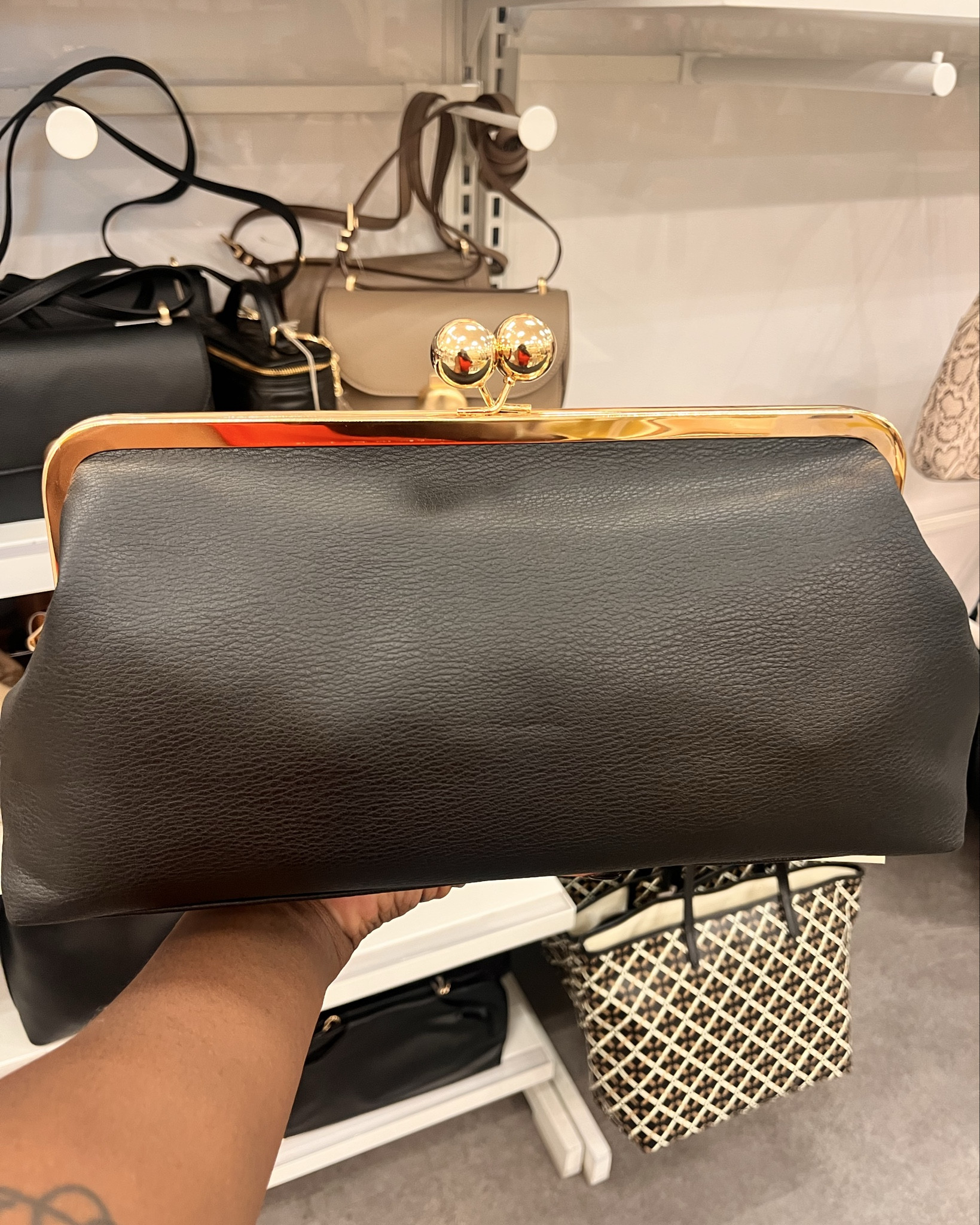 The Kiss Lock Clutch is at Target and what a steal!!!! It comes in black faux leather and brown faux suede 🖤🤎🖤🤎

#LTKItBag #LTKStyleTip #LTKFindsUnder50