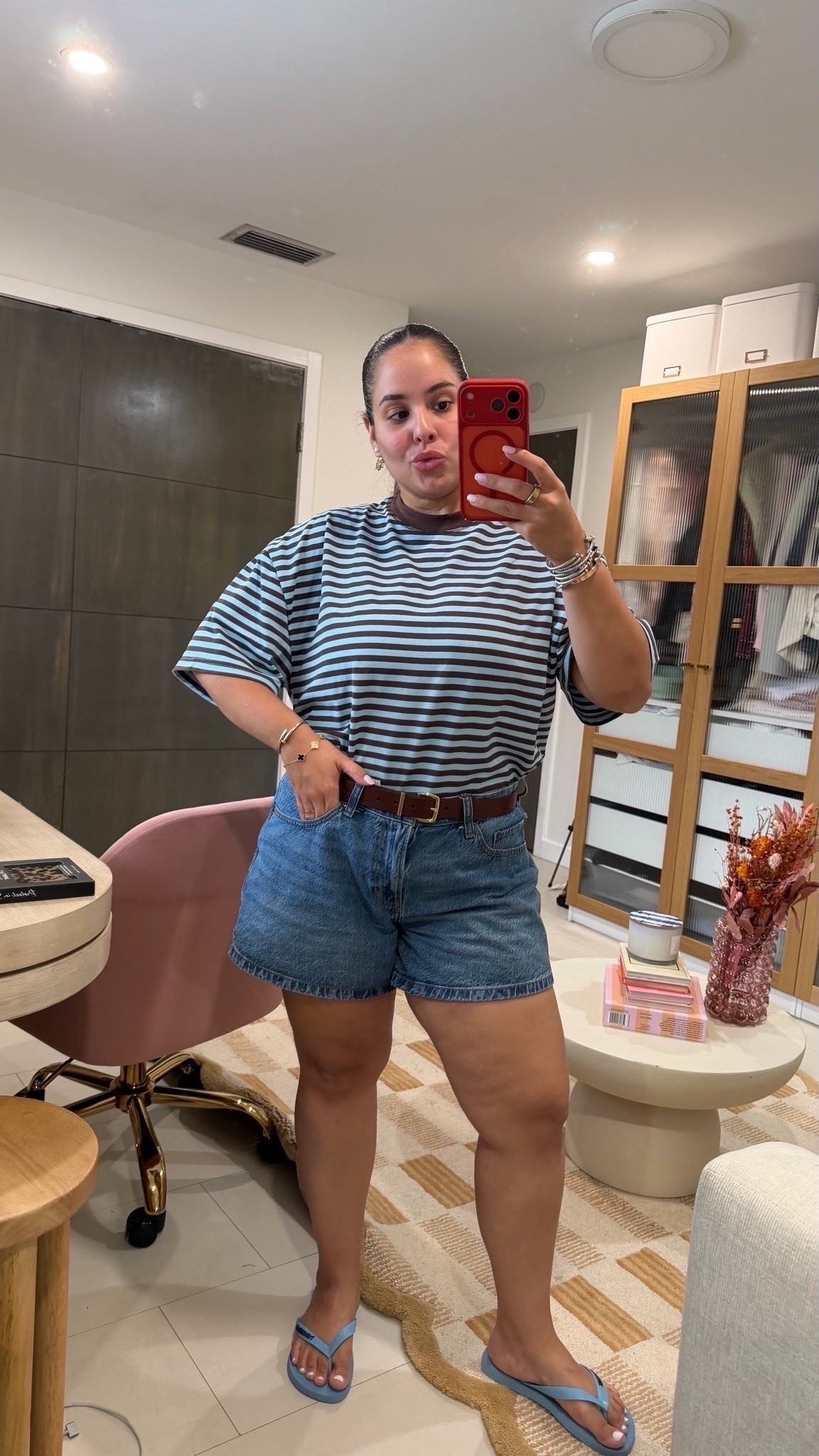 casual midsize summer outfit that takes zero effort 🤎🩵 brown and light blue striped oversized t-shirt from amazon, medium wash mid-length denim shorts from abercrombie, brown leather belt with gold buckle (also amazon), and light blue havaianas flip flops. the easy throw-on-and-go look — boxy striped tee, relaxed denim shorts, everyday summer sandals. curvy casual mom style, fully effortless. Top: L // Shorts: 30

#LTKootd #LTKmomlife #LTKMidsize