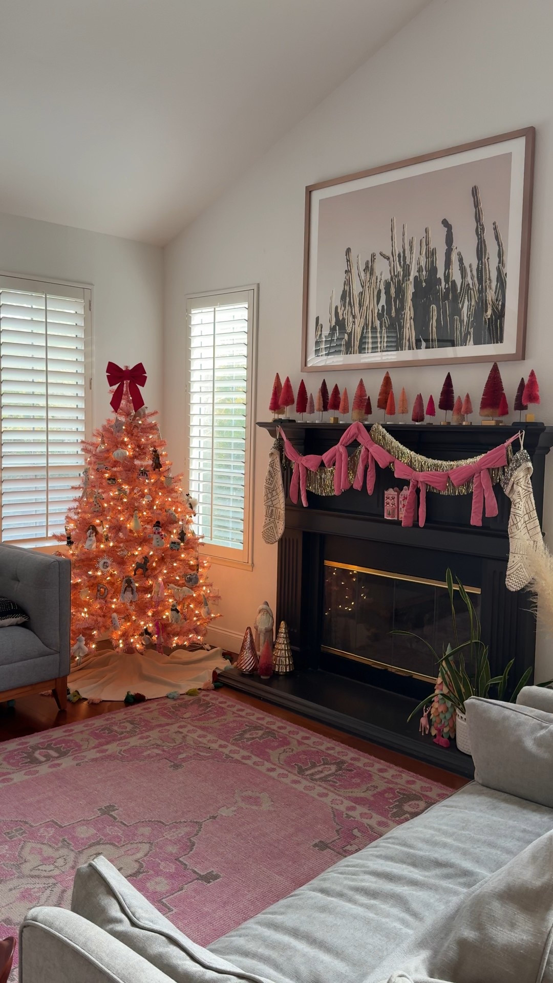 My pink Christmas room! Love this pink Christmas tree and added some fun pink bows for the garland along with my collection of pink and red bottle brush trees.

#LTKHome #LTKHoliday