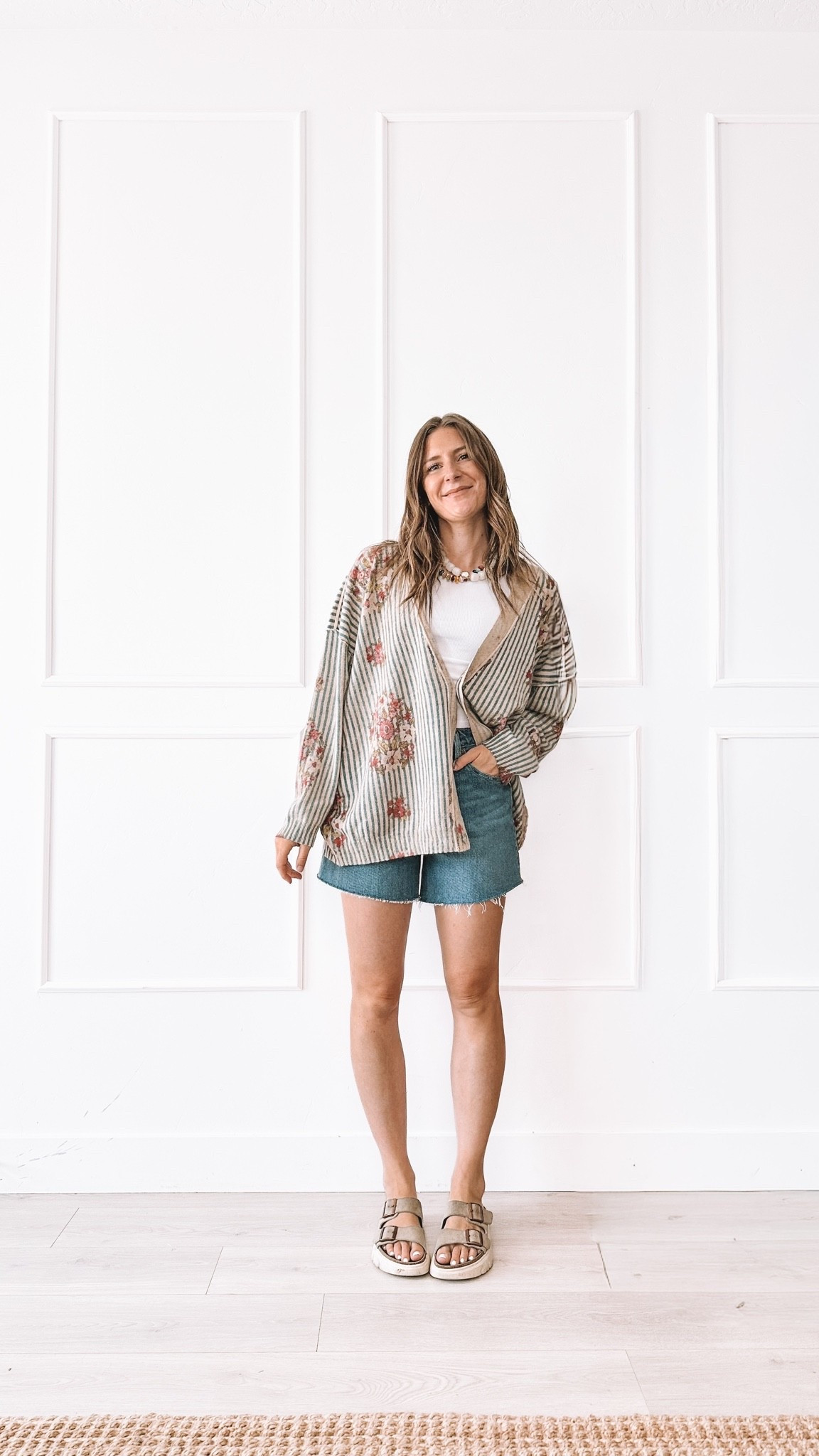 This reversible cardigan is doing the absolute most in the best way. One side is vibrant, one side is muted, so it is basically two cardigans in one. I sized up to the l/xl for that oversized cozy fit I love. Layered over a simple white tee and denim cutoffs, it is my throw on and go everyday look.

#LTKootd #LTKmomlife #LTKgrwm