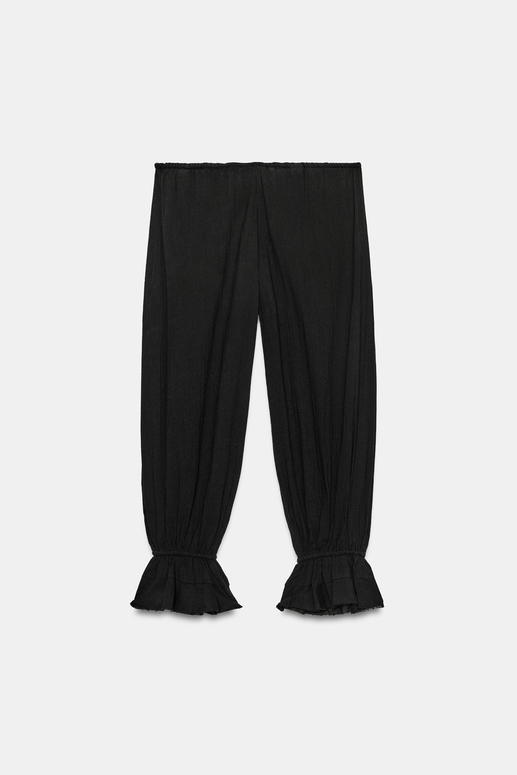 Mid-rise pants with an adjustable drawstring waist. Features elasticated cuffs with ruffle trim. | Zara US