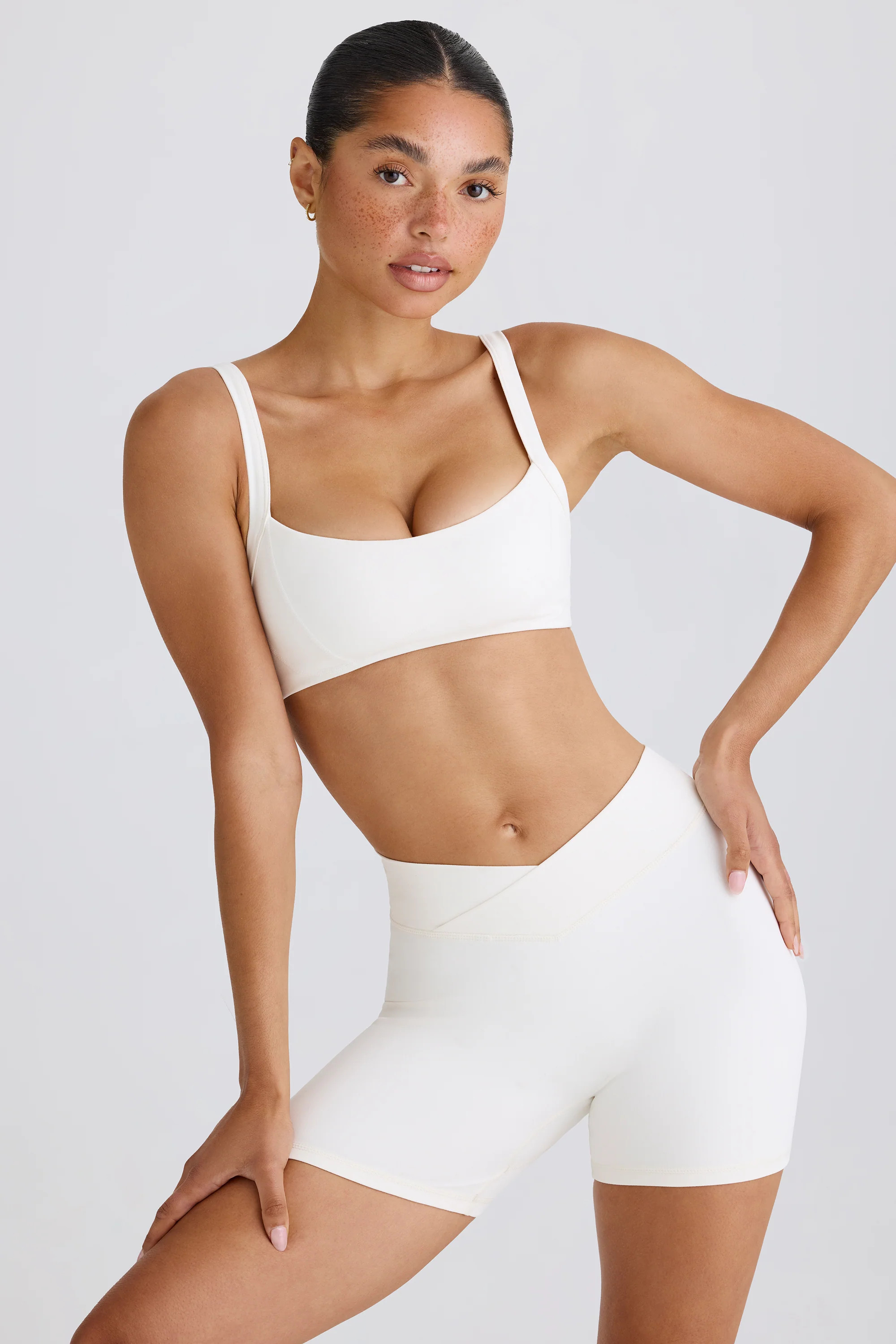 Soft Active Crossover Mini Shorts in White | Oh Polly