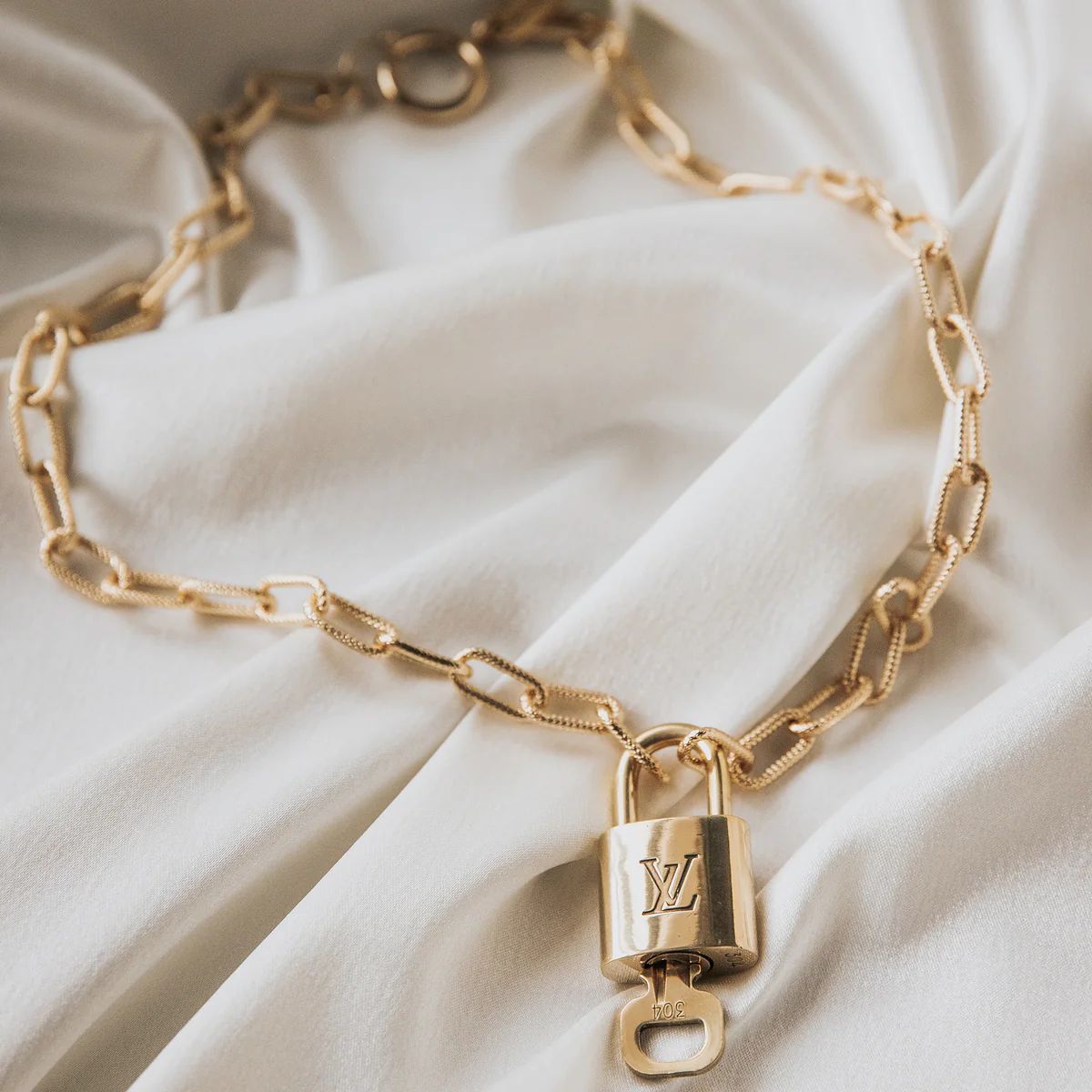 Vintage Louis Vuitton Lock Necklace | Erin Fader Jewelry Design