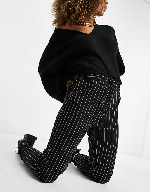 ASOS DESIGN woven jogger in black pinstripe | ASOS (Global)