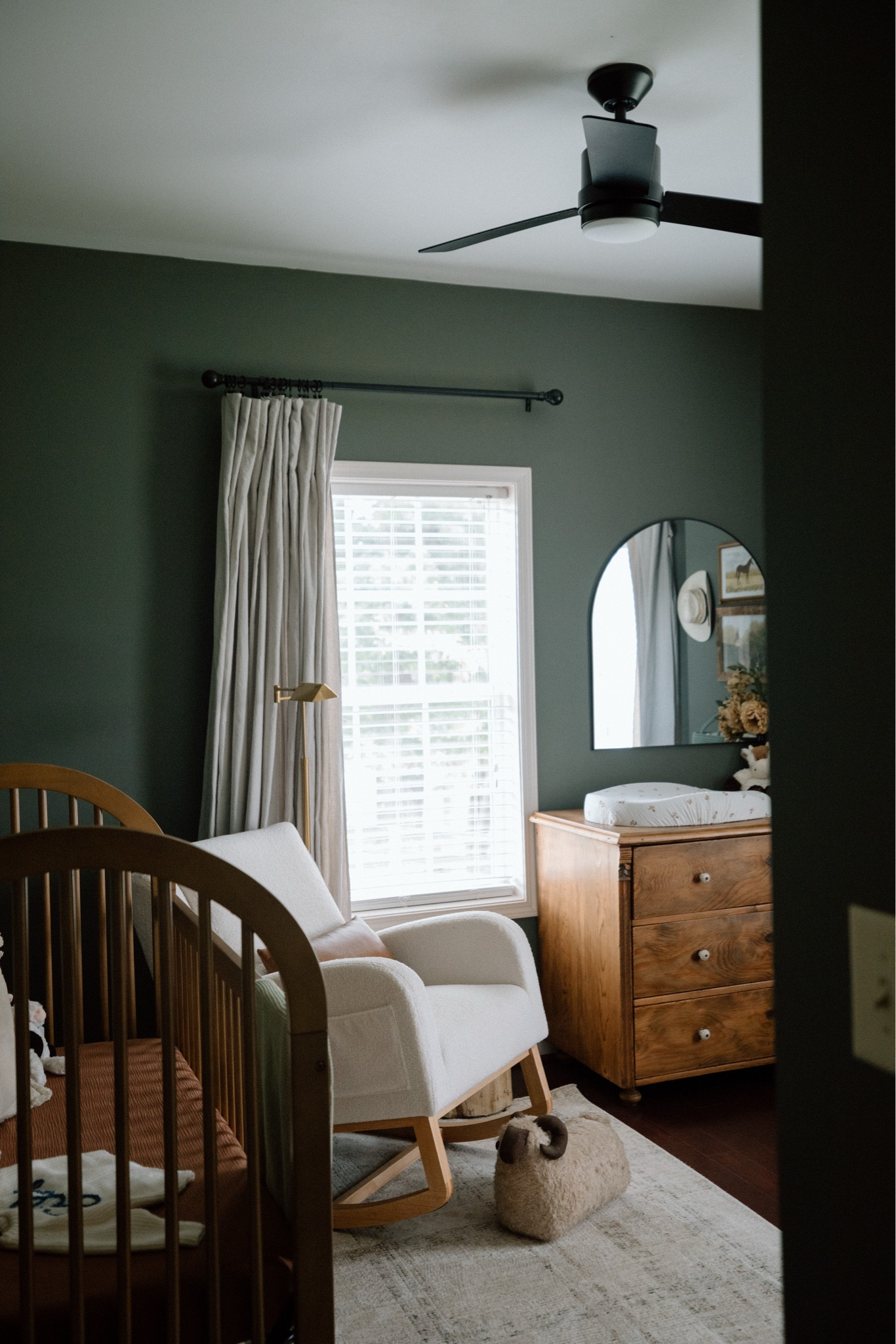 Baby boy nursery of my dreams!! Full of wood and gold accents in this moody room 💚

#LTKBaby #LTKHome