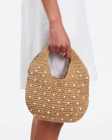 I’ve been looking for a small casual summer bag and I just found it! Love the straw raffia with beads and it’s a tight enough weave that nothing will fall out. Comes in black too!

Summer outfit
Top handle
Mini tote
Woven
Neutral 
Micro bag
Laid back
Beach vacation 
Gold jewelry rings
Saks Partner / Team

#LTKItBag #LTKFindsUnder50 #LTKStyleTip