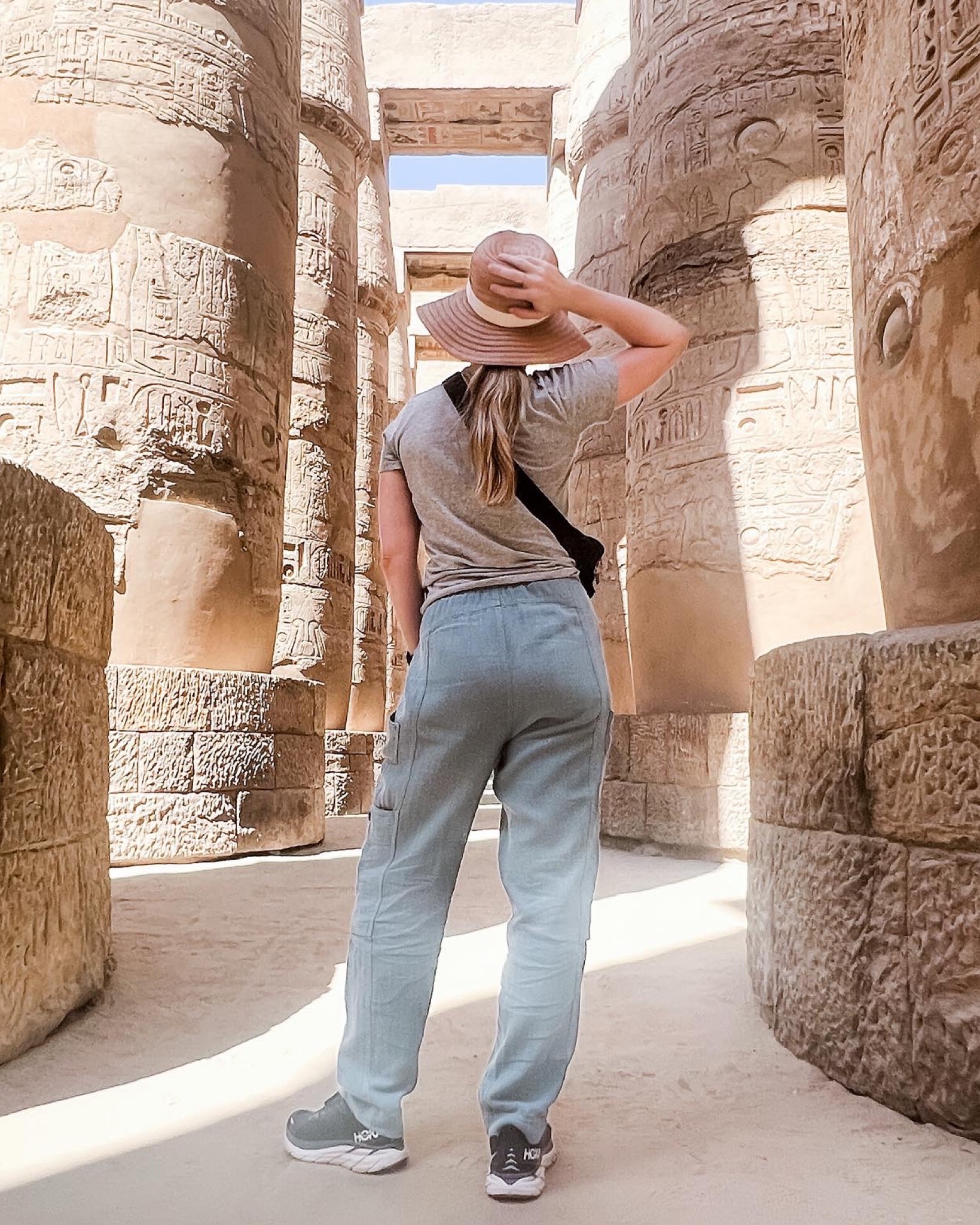 Karnak Temple in Luxor, Egypt. 

I wore this hat by Madewell every day I was in Egypt to protect myself from the sun. It’s packable and fits my big head well. I’m wearing the M/L although my exact color is no longer available. 

Free People pants run very large. I’m wearing a XS when I’m normally a small. My exact color isn’t available, but they’re on sale at Nordstrom right now  

#LTKsalealert #LTKtravel #LTKunder100