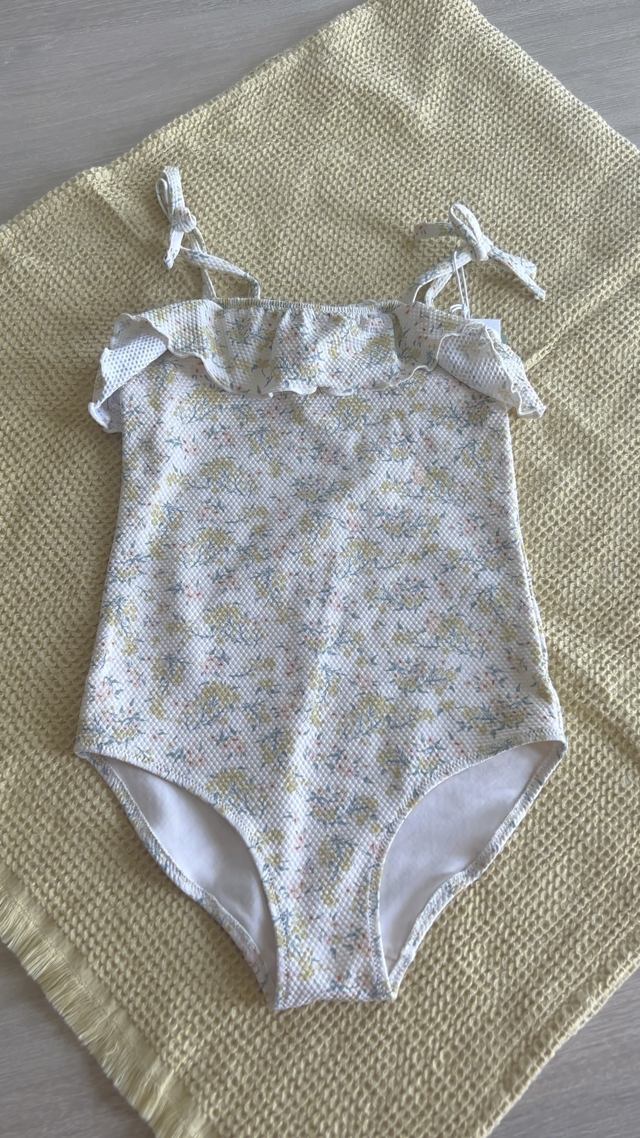 Little girls boho bathing suit. Neutral color. Ruffles, ties, swimsuit. H&M, ruffle butts, and Amazon. Vacation. 

#LTKSeasonal #LTKunder50 #LTKkids