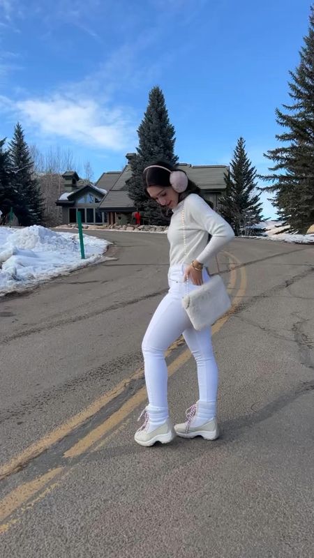 Winter whites! All white winter outfit inspiration. White turtleneck sweater, white jeans, amazon boots (snow boots), fluffy crossbody bag, pink earmuffs, and gold jewelry. Xoxo

#LTKVideo #LTKtravel #LTKshoecrush