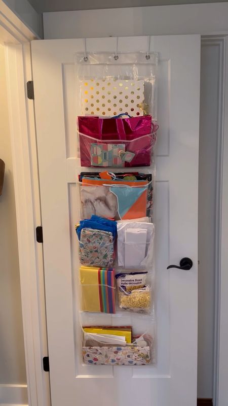 🎁 Gift wrap organization for under $10 from Walmart!!! I got this over the door organizer and it has the perfect size sections for all of my different gift bags, tissue, & wrapping essentials.

#giftwrap #organized #organization #giftwraporganization #organizingideas #walmart #walmartfind #walmartmusthave 

#LTKFindsUnder50 #LTKHome #LTKVideo