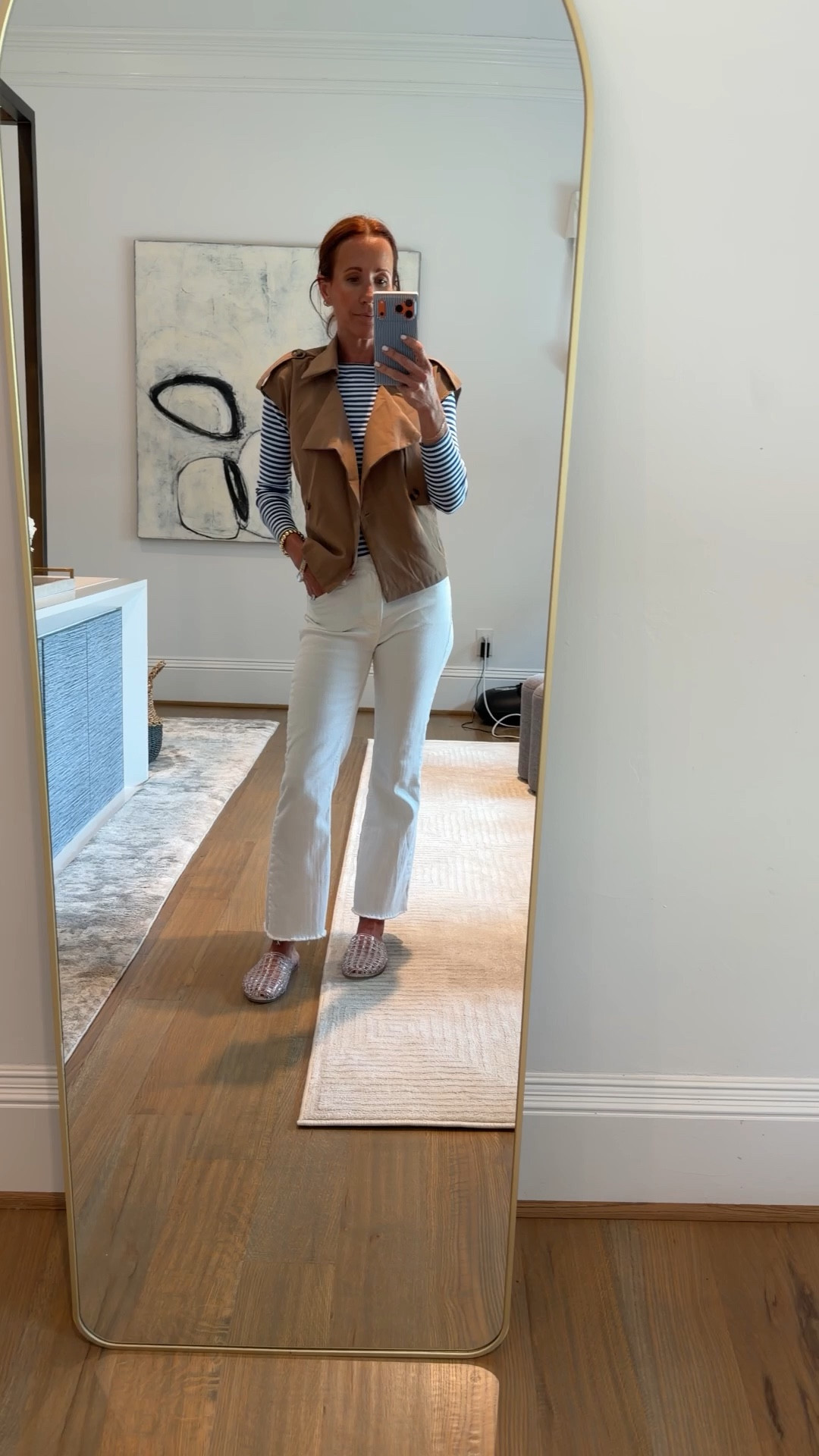 OOTD: easy spring outfit formula that always works

Striped long sleeve + neutral utility vest + white straight leg jeans = effortless but pulled together. This is one of those outfits that feels casual but still looks intentional (aka my favorite kind). The vest adds just enough structure and makes a basic tee look styled.

Wearing:
	•	lightweight striped top (great layering piece for spring)
	•	tan utility vest (perfect transitional layer)
	•	white straight leg jeans (flattering fit, easy to dress up or down)
	•	neutral woven flats (comfortable everyday shoe)

If you’re stuck in a jeans + tee rut, just add a vest. It changes everything.

#LTKootd #LTKPetite #LTKOver40