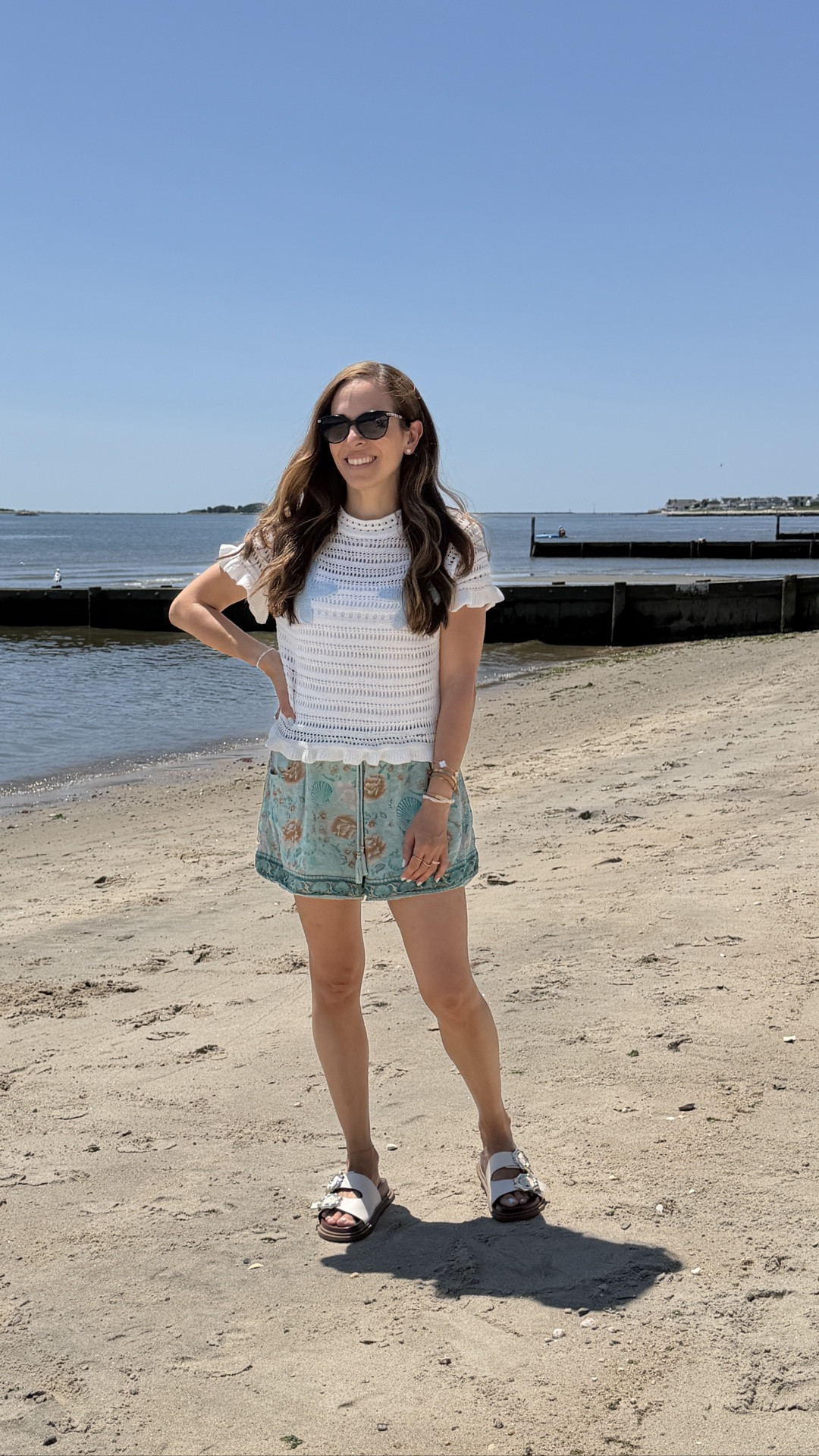 Taking in the small moments (like a solo beach moment with my baby while my toddler was at ballet camp). What are you grateful for this summer? Tell me in the comments 👇🏼 
This look is so affordable and I love how my starfish detail crochet top can go over anything for a casual beach day or dressed up to go out for a beachy chic look. Styled it with older seashell shorts but linked similar & some of my fave sandals for summer. My beach chair that is so practical and aesthetically pleasing is linked (the cup holder and phone pouch to keep water out and sand are so handy as accessories to grab for it too, & you can even get a sunshade for it!) there are many prints my husband has a navy and white striped one.

#LTKmomlife #LTKootd #LTKdayinmylife